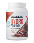 GENTEC Hydro Pro WPI chocolate protein powder container with 810g label, showing the product packaging and branding.