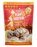 Macro Mike Plant Based Protein in caramel cinnamon bun flavor, 1kg jar, featuring a scoop of protein powder and cinnamon sticks.