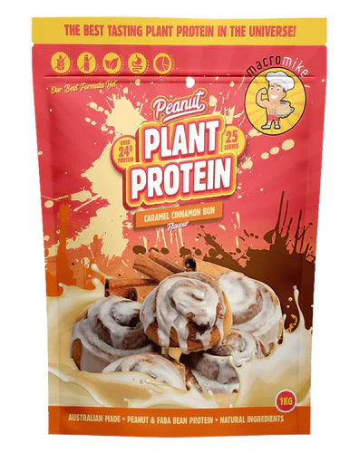 Macro Mike Plant Based Protein in caramel cinnamon bun flavor, 1kg jar, featuring a scoop of protein powder and cinnamon sticks.