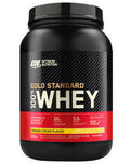 Optimum Nutrition 100% Gold Standard Whey protein powder container with label and scoop in front.
