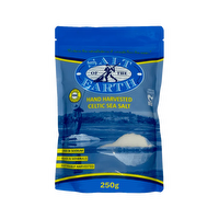 Celtic Sea Salt from Salt of the Earth, showing coarse Himalayan salt crystals in a clear container.