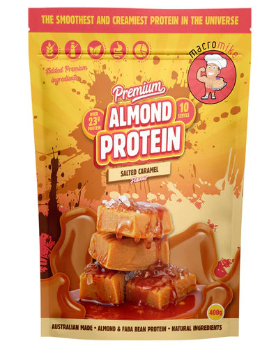 Container of MACRO MIKE Almond Protein powder with label visible, showcasing the MACRO MIKE brand and product packaging.