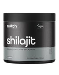 Switch Nutrition Shilajit supplement in a jar with a scoop, showing the natural resin and packaging for health and wellness.