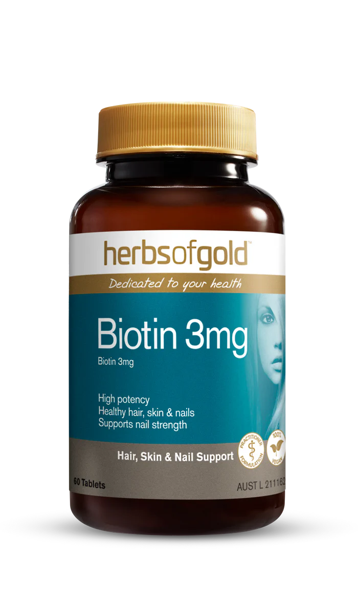 Herbs of Gold Biotin 3mg supplement bottle with label showing herbal branding and product details.