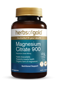 Herbs of Gold Magnesium Citrate 900 supplement bottle with label, featuring natural herbal imagery and product details.