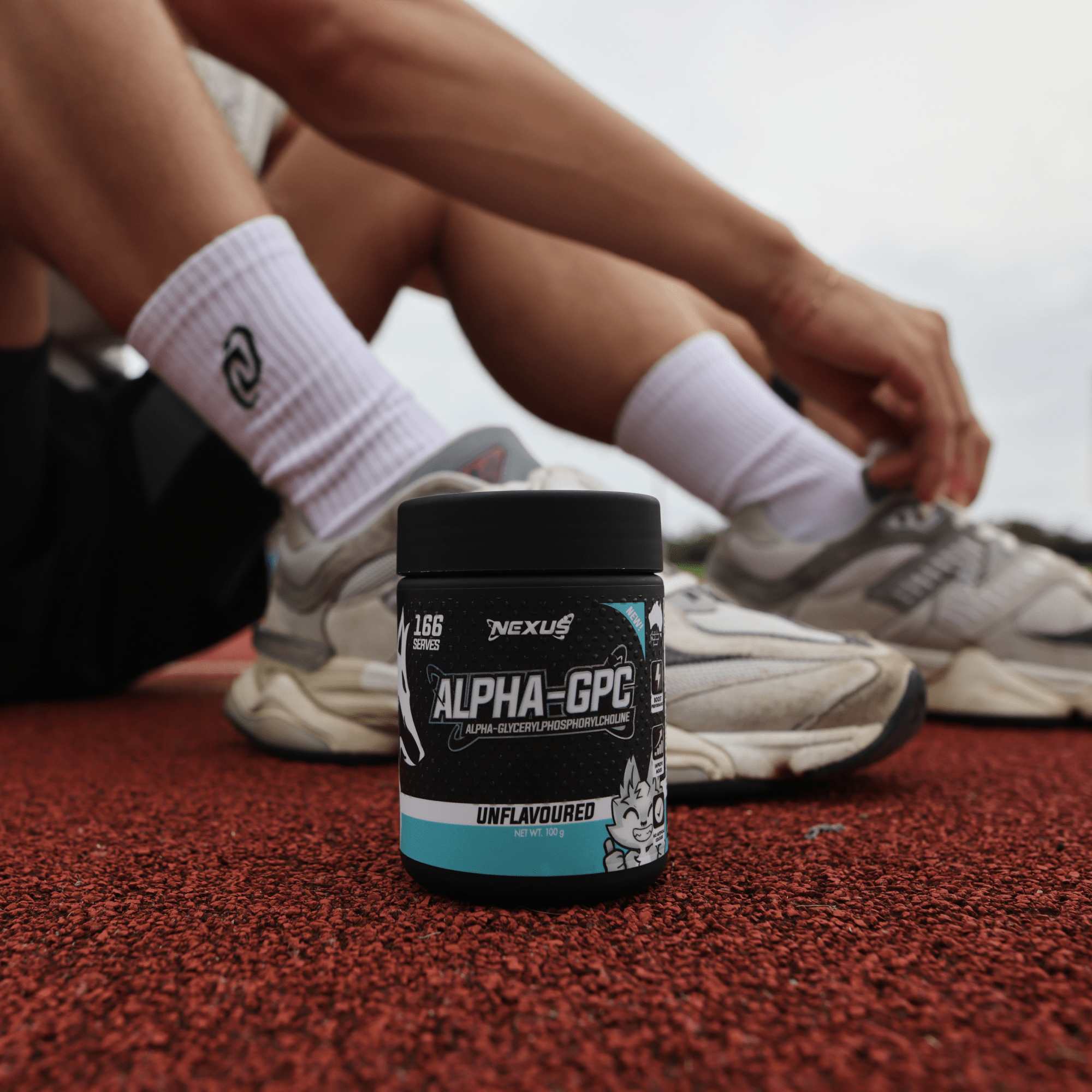 Nexus Sports Nutrition Alpha GPC supplement bottle with label showing capsule images and product details.