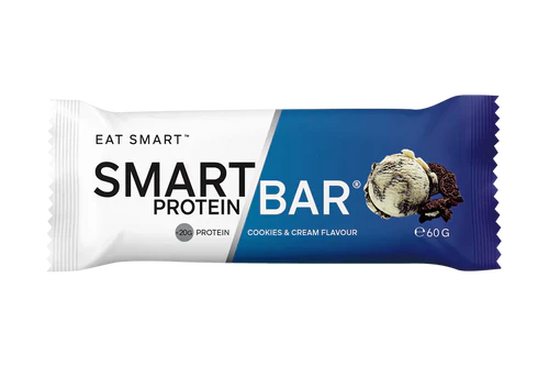 Cookies and cream SMART PROTEIN BAR from SMART DIET SOLUTIONS, showing a close-up of the chocolate-coated protein bar with cookies bits