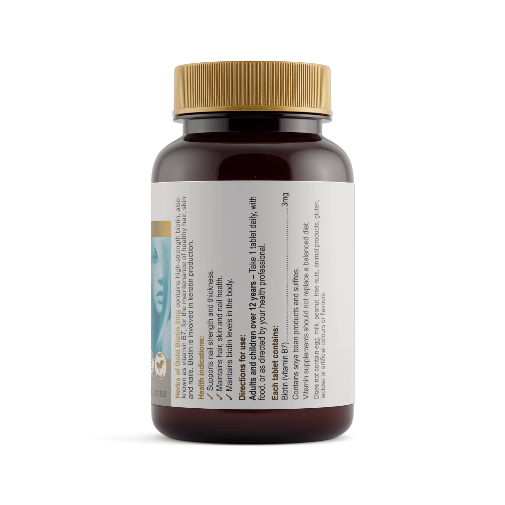 Bottle of Herbs of Gold Biotin 3mg supplement with label showing herbal branding and dosage information.