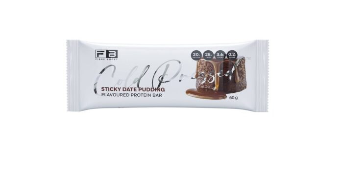 FIBRE BOOST Protein Bar with sticky date pudding flavor, showcasing the bar's texture and appetizing appearance.
