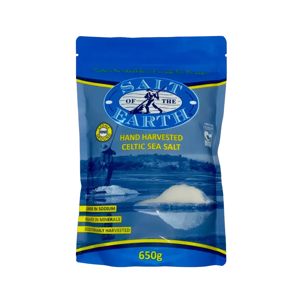 Celtic Sea Salt from Salt of the Earth, coarse natural salt crystals in a clear container, highlighting its mineral-rich texture.
