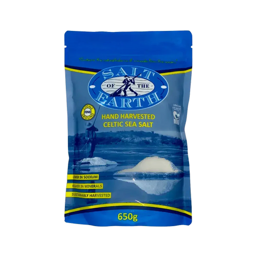 Celtic Sea Salt from Salt of the Earth, coarse natural salt crystals in a clear container, highlighting its mineral-rich texture.