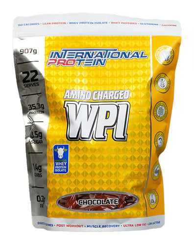 International Protein Amino Charged WPI chocolate protein powder container with label and scoop in clear view.