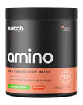 Switch Nutrition Amino Switch powder in green apple flavor, showing a close-up of the vibrant green apple flavor packaging.